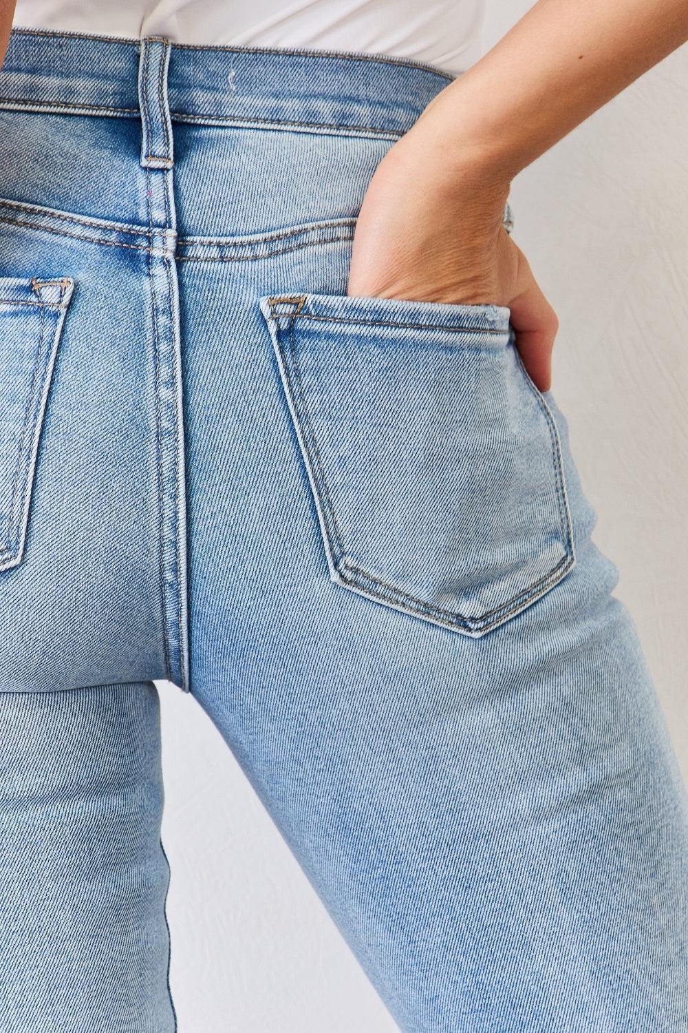 a woman's butt is shown with her hands in her pockets