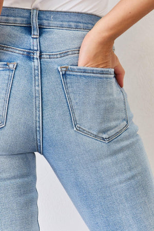 a woman's butt is shown with her hands in her pockets