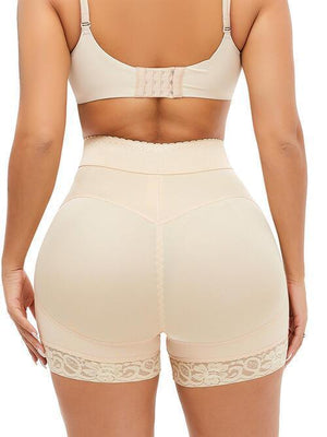 a woman in high waist shorts and a bra