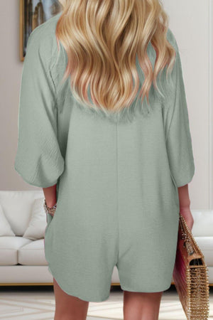 the back of a woman wearing a green romper