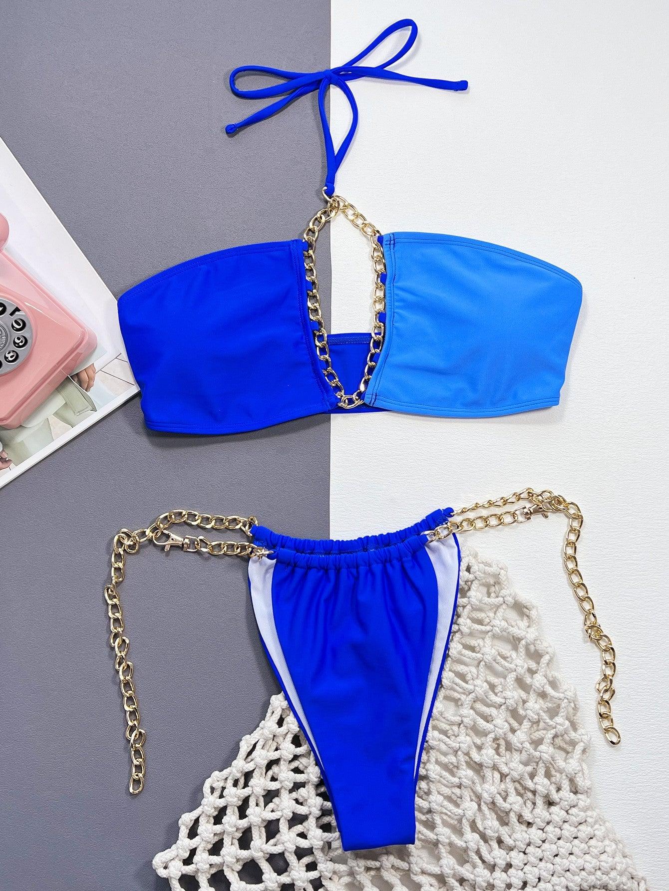 two pieces of blue and white bikinis with chains