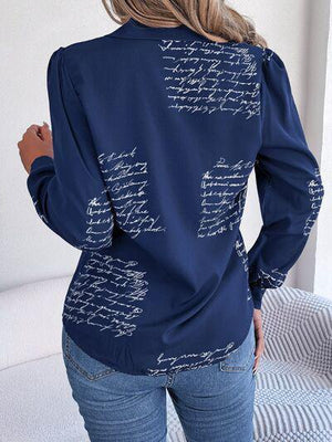 a woman wearing a blue shirt with writing on it