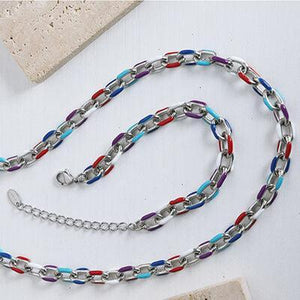 a silver chain with a red, white, and blue link