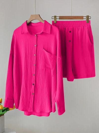 a pink shirt and shorts hanging on a clothes rack