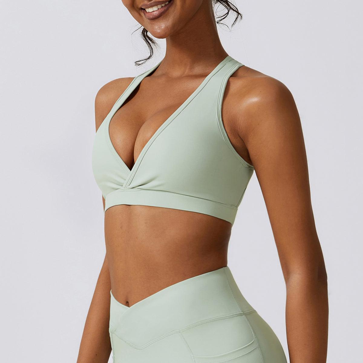 a woman in a green sports bra top