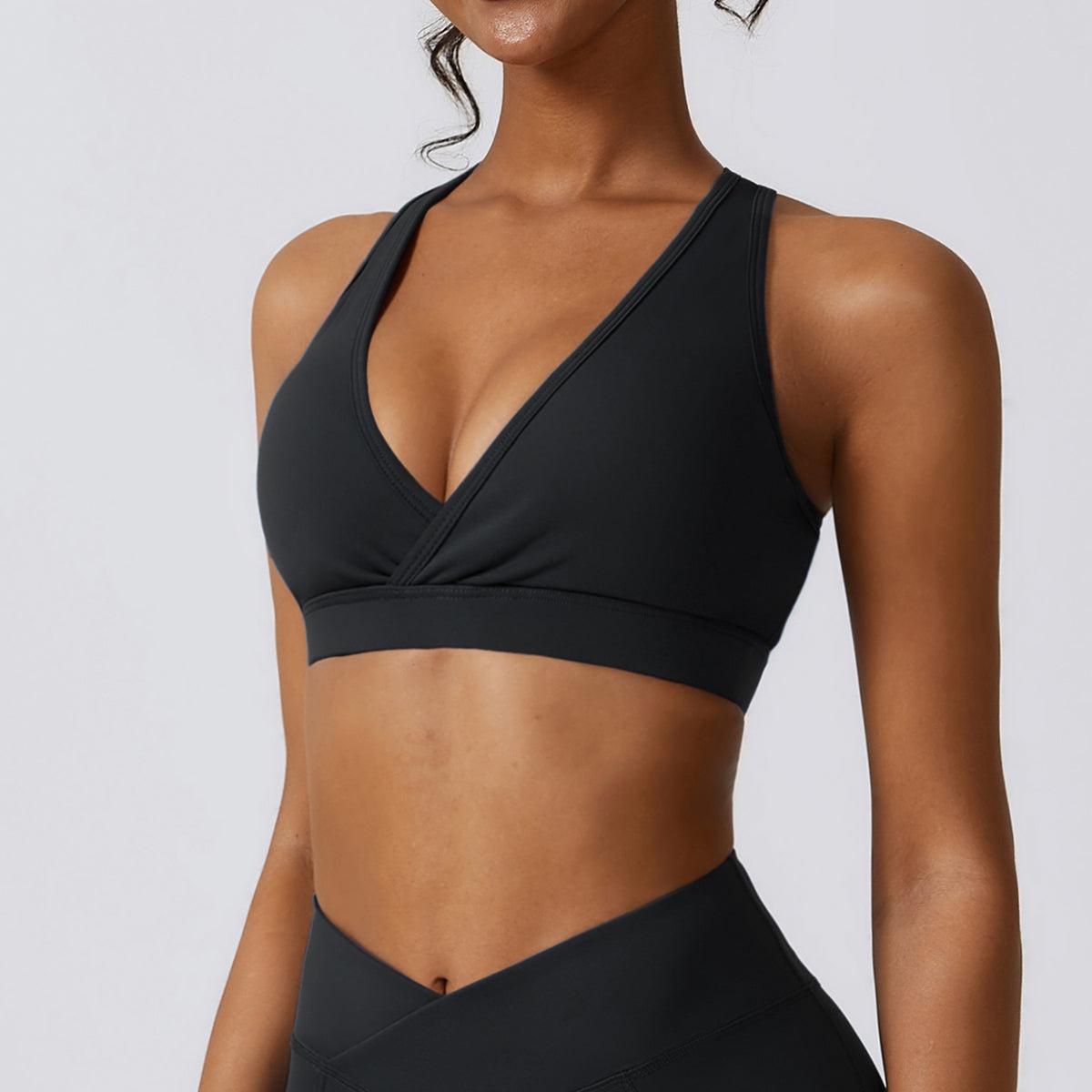 a woman in a black sports bra top