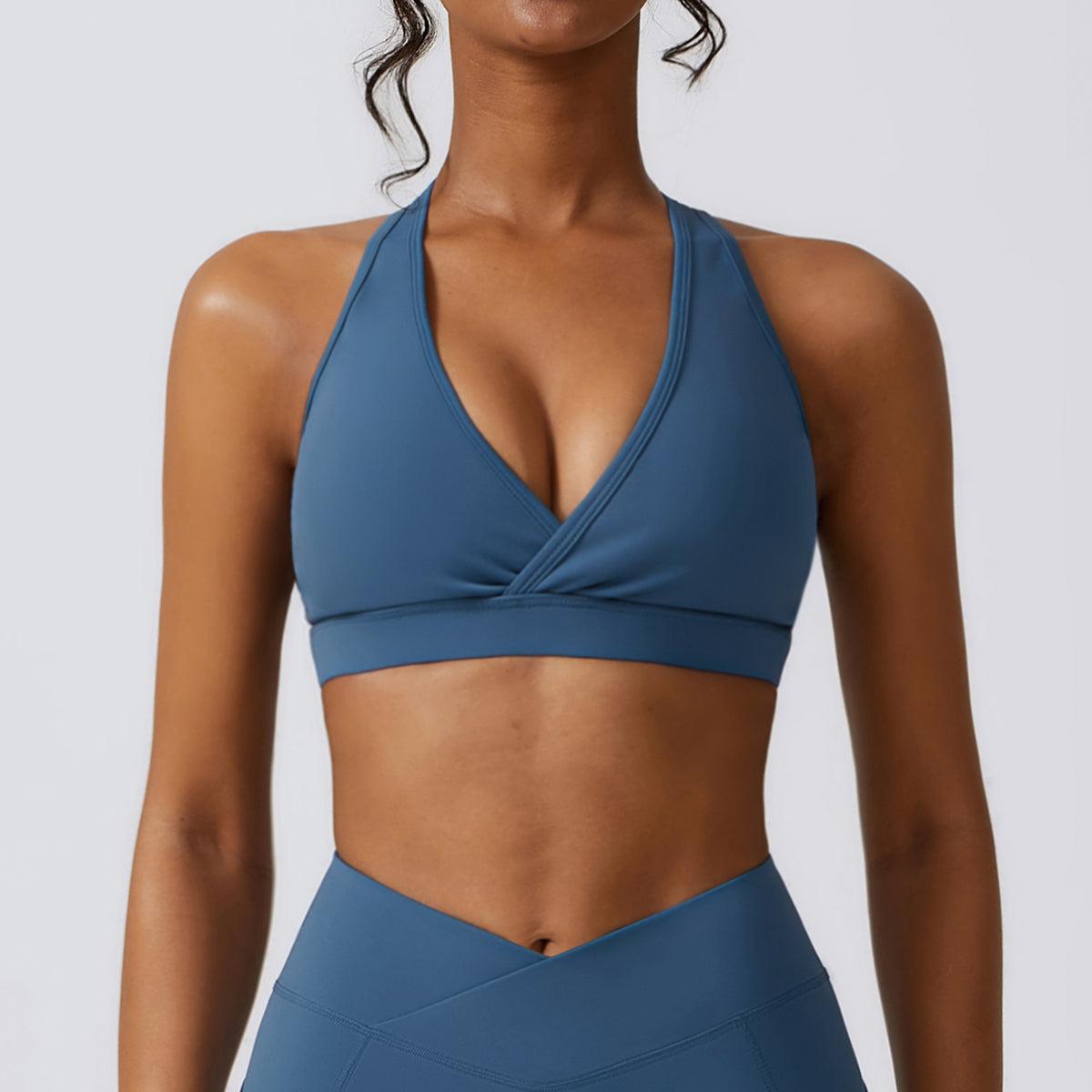 a woman in a blue sports bra top