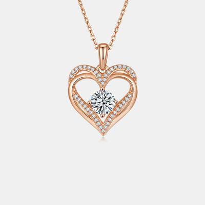 a heart shaped pendant with diamonds on a chain