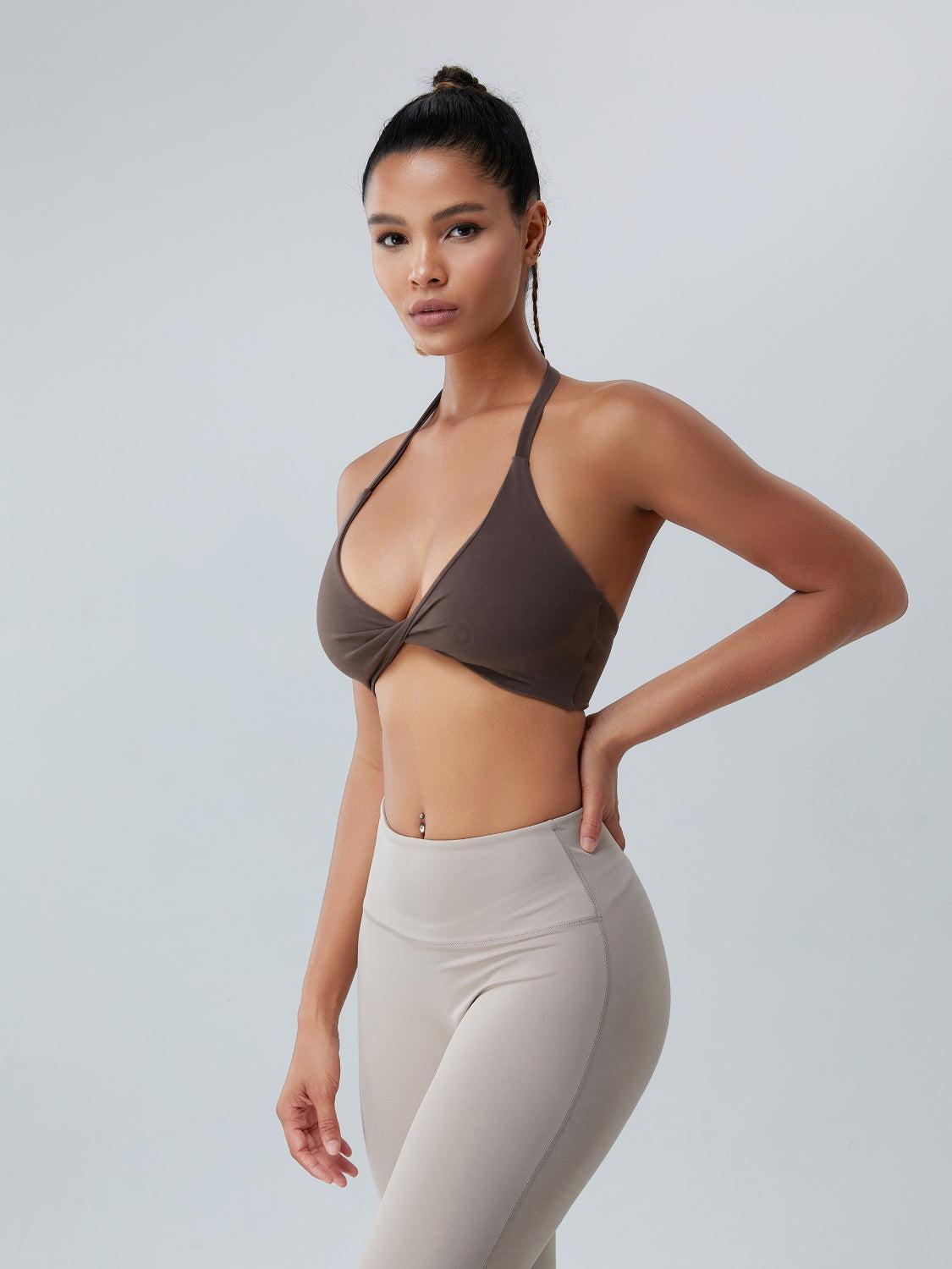 a woman wearing a bra top and leggings