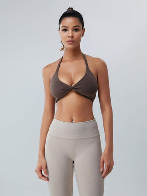 a woman in a sports bra top and leggings