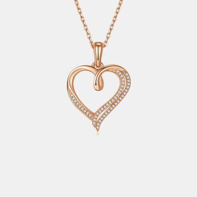 a diamond heart pendant on a chain