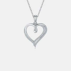 a diamond heart pendant on a chain
