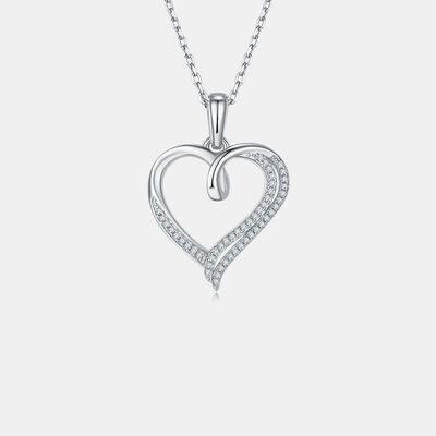 a diamond heart pendant on a chain
