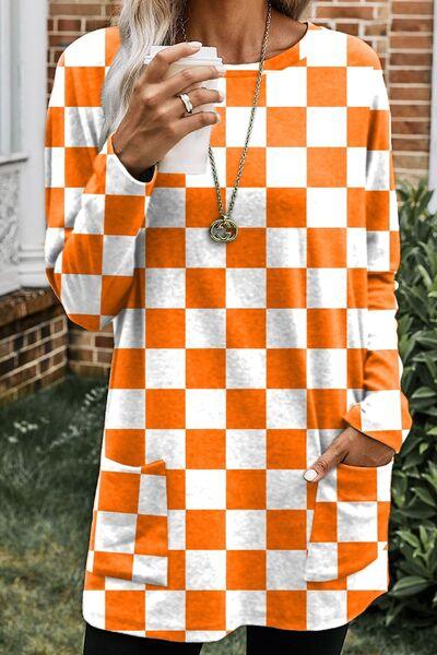 a woman wearing an orange and white checkered top