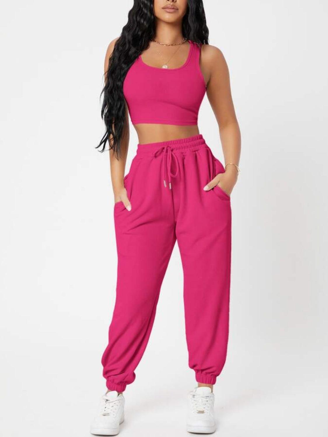 a woman in a pink top and pants
