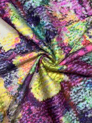 a multicolored fabric with a white background