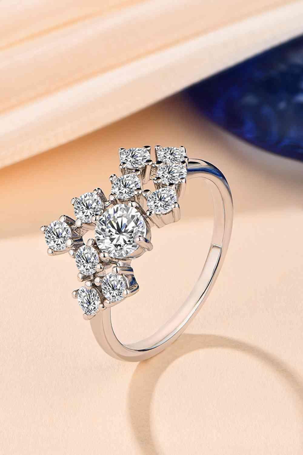 a white gold ring with a cluster of diamonds