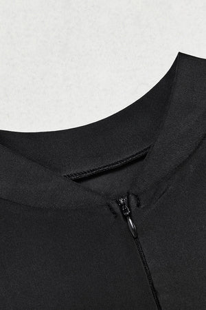 a close up of a black jacket with a zipper