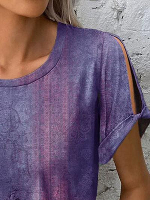 a close up of a woman wearing a purple shirt
