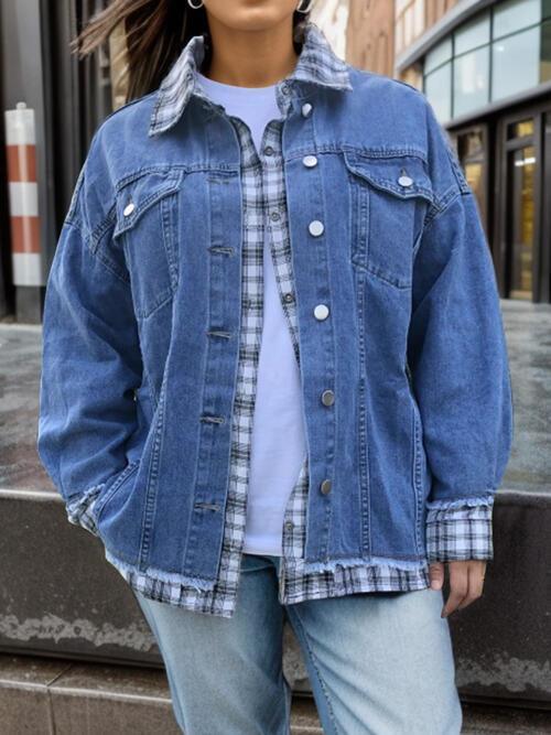 a woman wearing a denim jacket and jeans