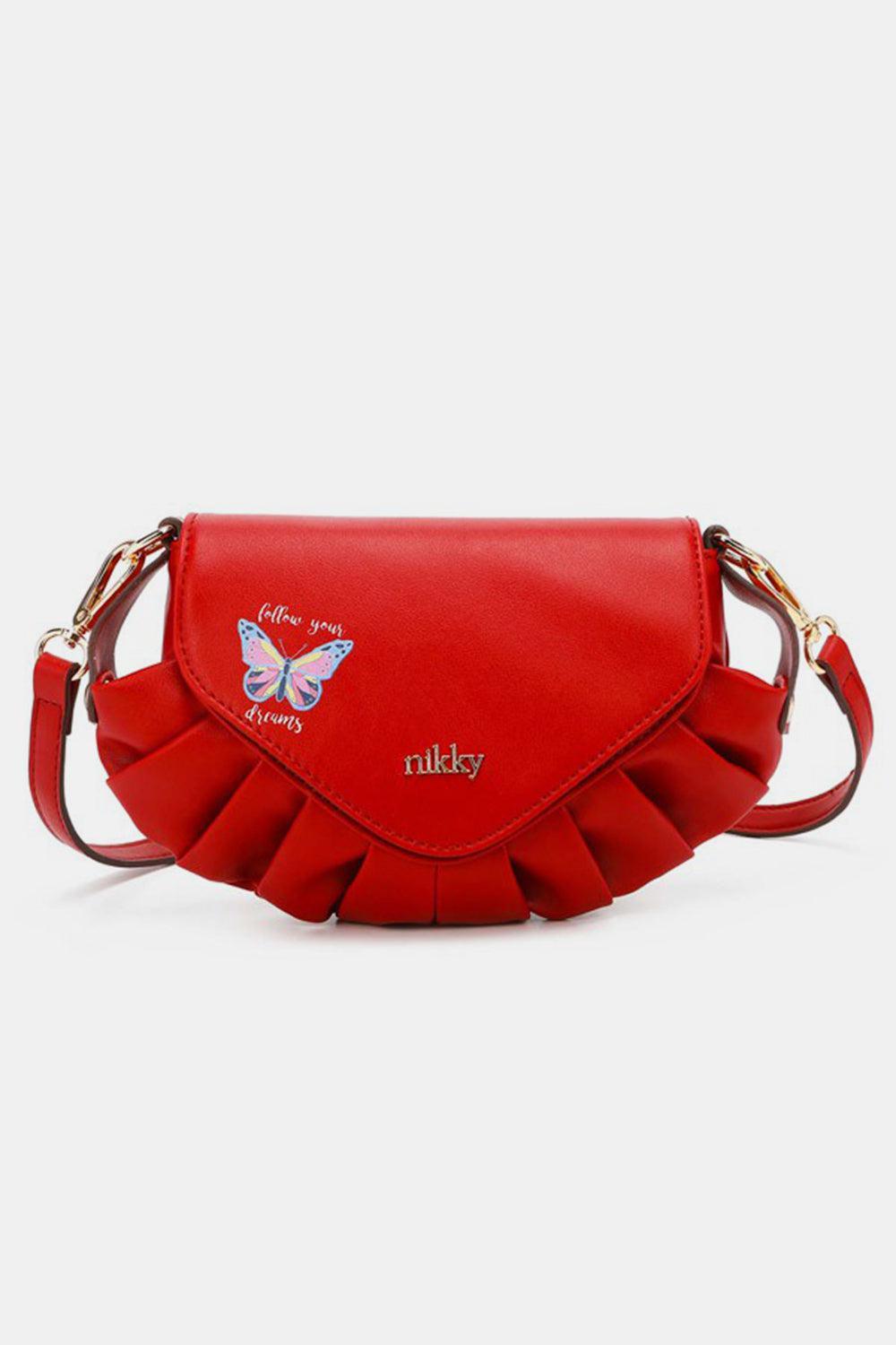 a red purse with a butterfly on it