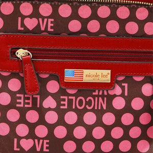 a red purse with a polka dot pattern