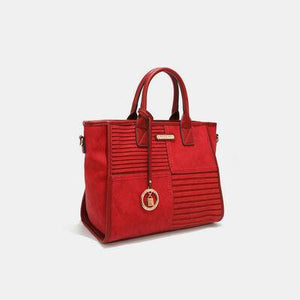 a red handbag on a white background