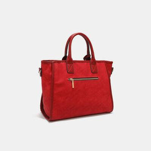 a red handbag on a white background
