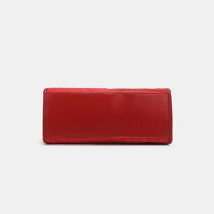 a red leather wallet on a white background