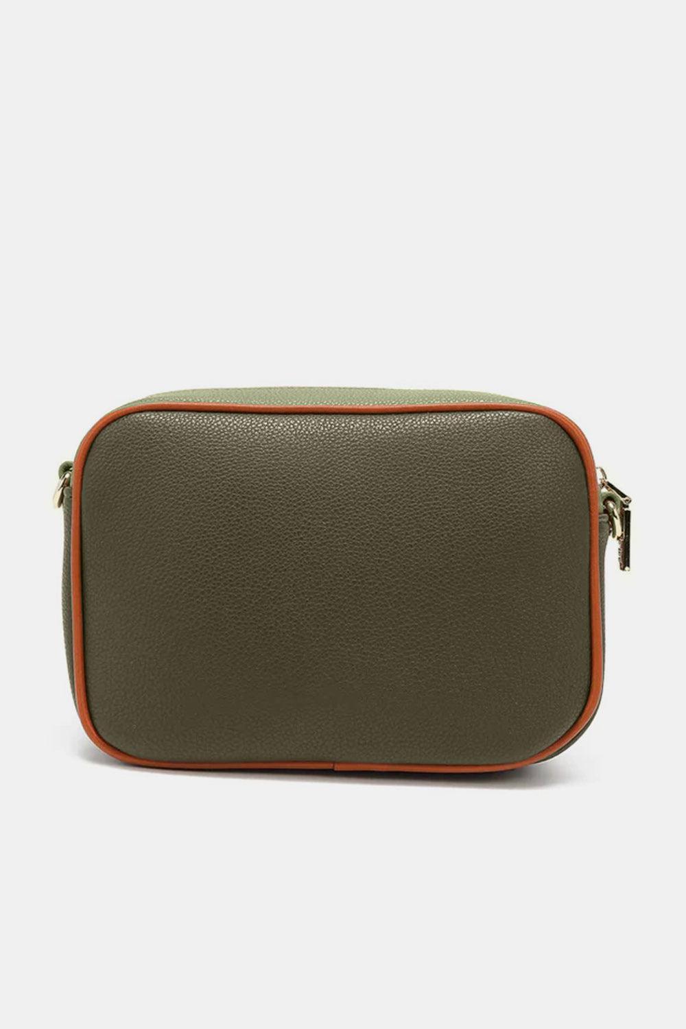 a green and orange leather case