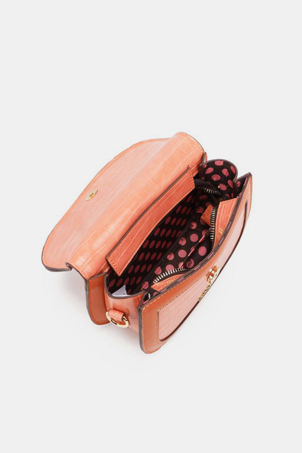 a handbag with a polka dot print inside