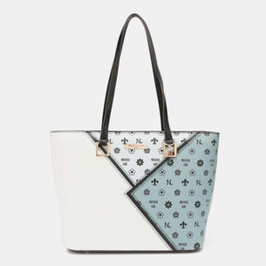 a white and blue handbag with a black handle