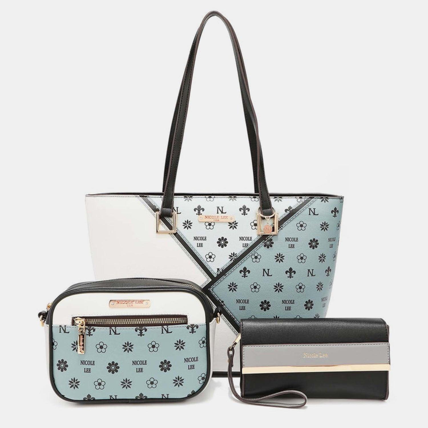 a purse, wallet, and wallet sitting next to each other