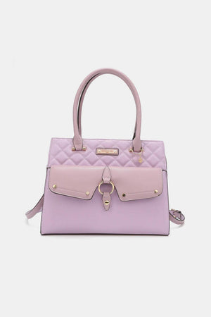 a pink and purple handbag on a white background