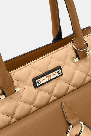 a tan purse with a black handle and a name tag