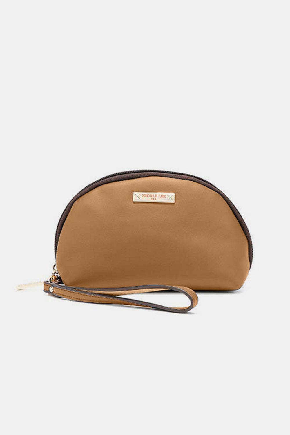 a small tan purse with a brown strap