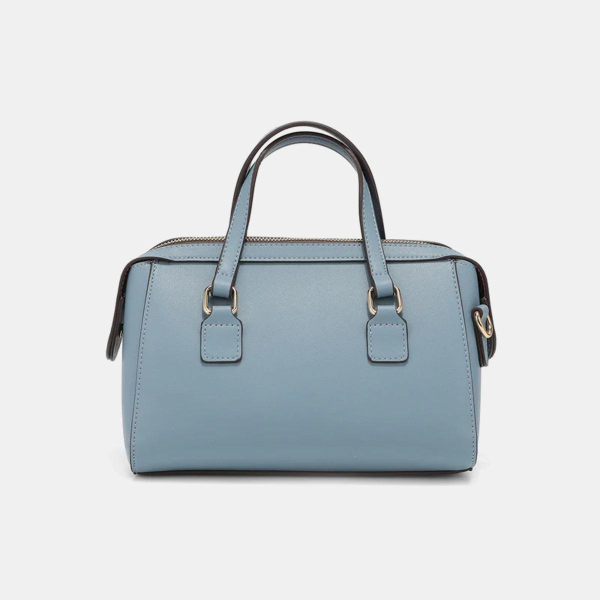 a blue handbag on a white background