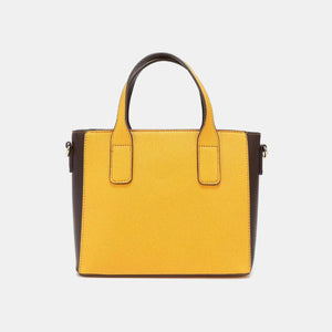 a yellow handbag with a brown handle