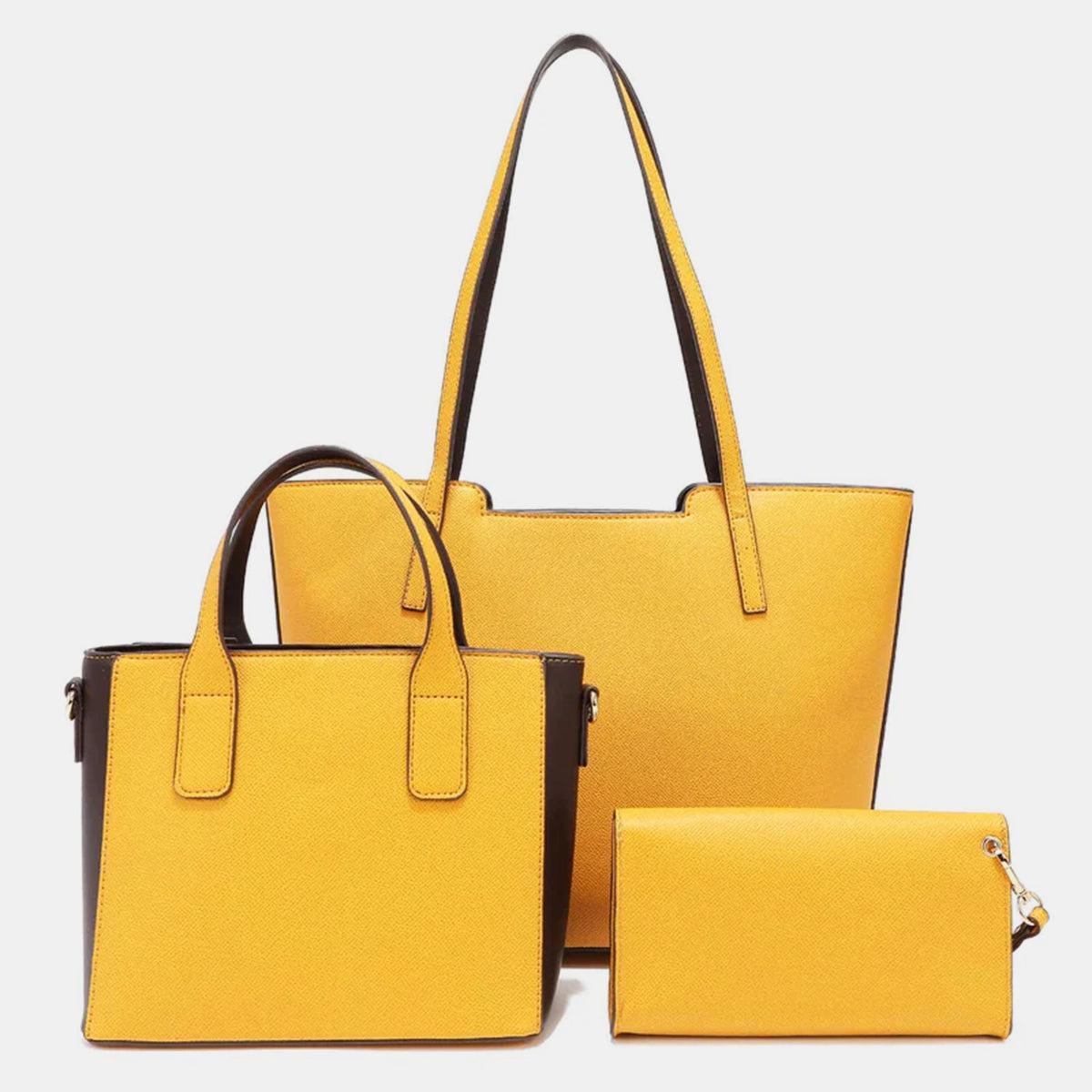 a yellow purse and wallet sitting next to each other