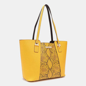 a yellow handbag with a snake skin pattern