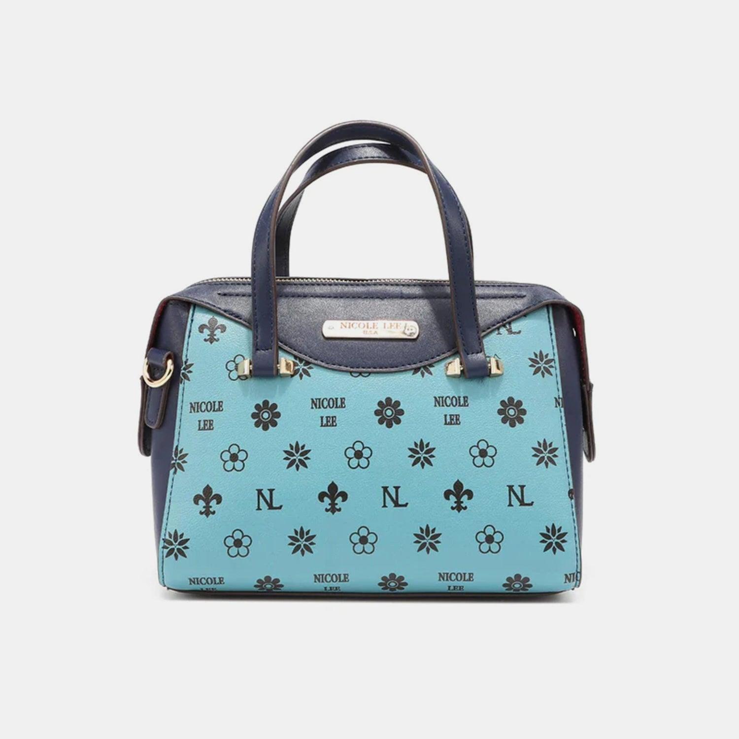 a blue handbag with a flower pattern on it