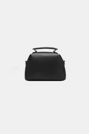 a black handbag on a white background