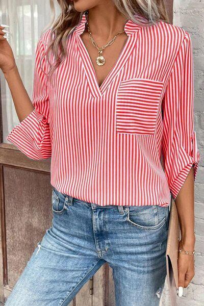 a woman wearing a red and white striped shirt