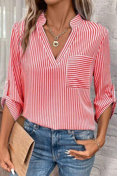 a woman wearing a red and white striped shirt