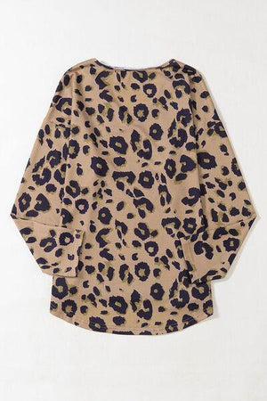 a top with a leopard print on it