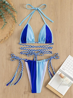 a blue and white bikini with a tie around it