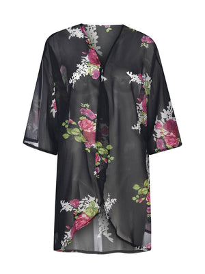 a women's blouse with flowers on it