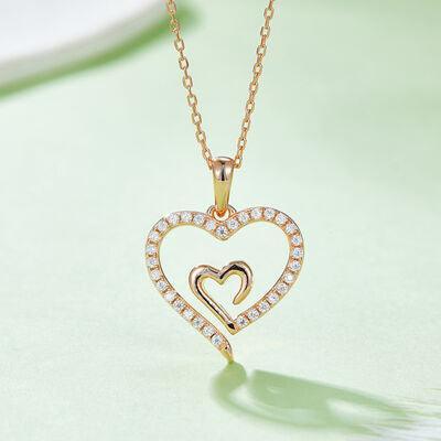 a diamond heart pendant on a chain