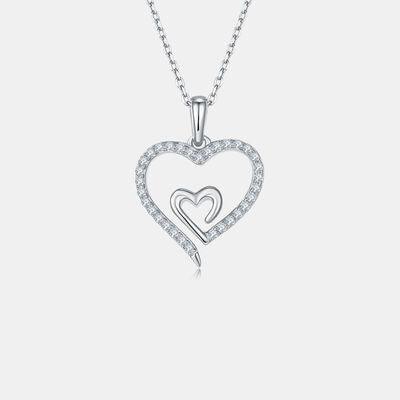 a diamond heart pendant on a chain