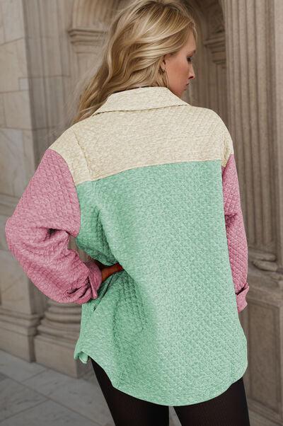 a woman standing in front of a building